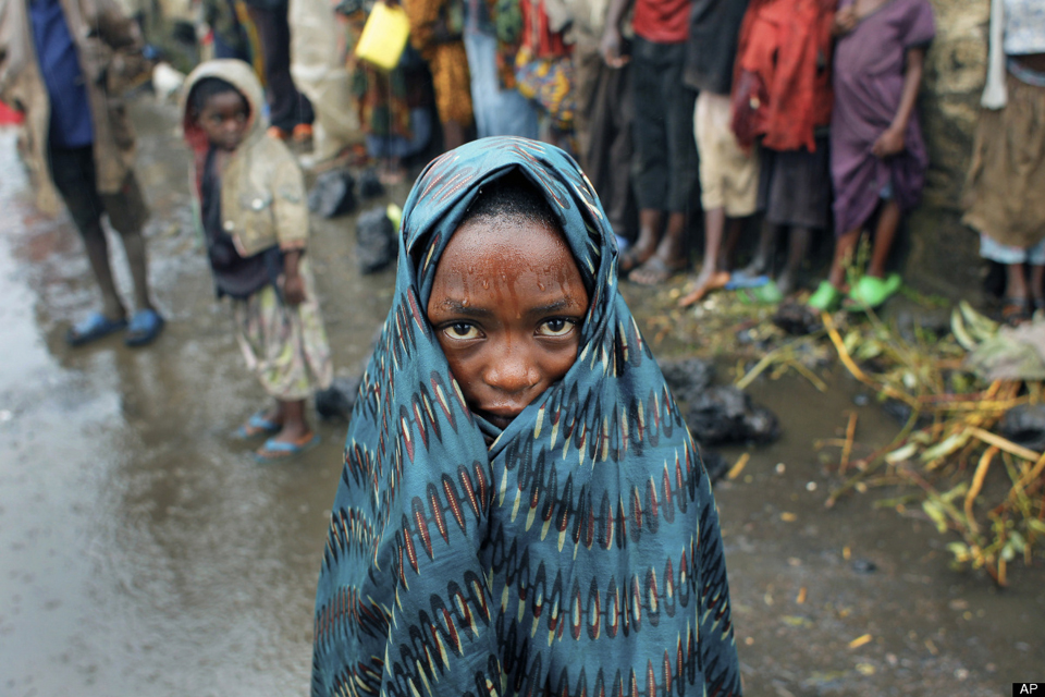 Drenched-Congolese-child-Kibati-north-of-Goma-eastern-Congo-080812-by-Jerome-Delay-AP[1]